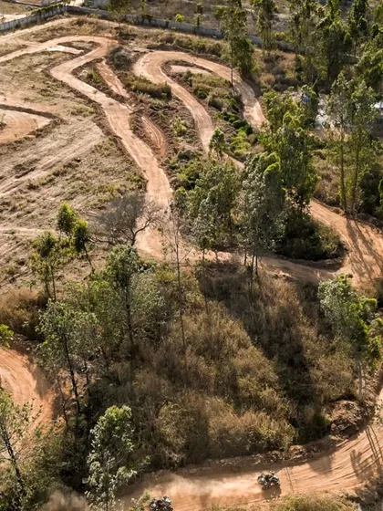 An incredible aerial view of our winding dirt kart track, carved into the natural landscape.