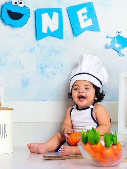 This happy little chef is ready to cook up a storm. The bright and cheerful kitchen set is designed to bring out the biggest smiles.