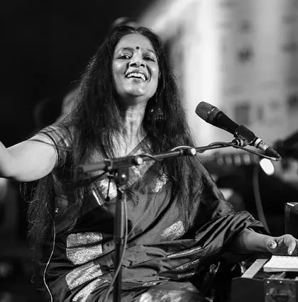 Lost in the music at the Bengaluru Ganesh Utsava. This black and white photograph captures the pure joy and connection I feel when I perform, a moment where everything else fades away except the song.