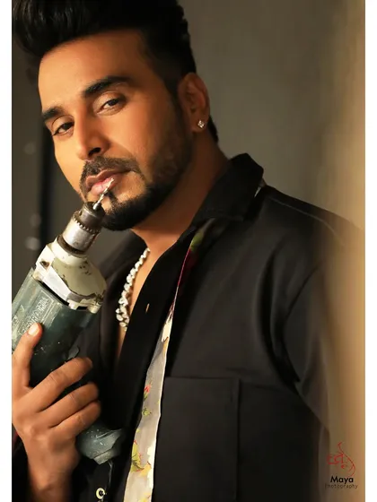 An edgy portrait of Bollywood choreographer and director Firoz A. Khan. I work with artists to create portraits that reflect their professional brand, using props and lighting to build a specific character.