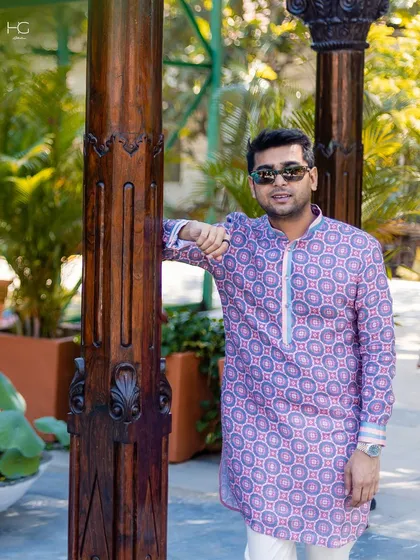 This festive season, I encourage making a statement with prints. This geometric-patterned kurta offers a bold yet traditional option for daytime functions.