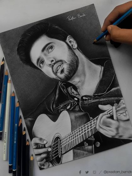 Follow the 90-hour journey of my Armaan Malik portrait. These progress shots show how I use the grid method to ensure accuracy and build up the face, hair, and clothing textures.