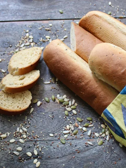 Our in-house baguettes are crafted with whole-wheat goodness and a sprinkle of herbs and seeds, elevating every bite to a flavorful experience.