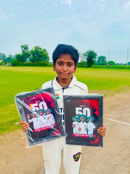Rishabh proudly holding his awards. This is just the start of his journey.