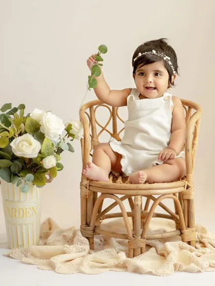 Cutie of the month. This little one, at her sitter session, is looking so sweet and stylish in her simple, elegant setup.