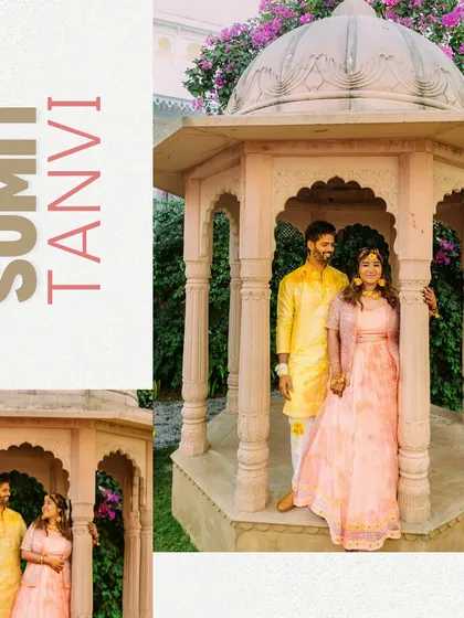 A romantic portrait of the couple in a carved stone gazebo, surrounded by the beautiful gardens of their Udaipur wedding venue.