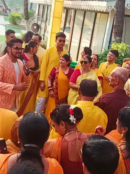 In the midst of a happy crowd at a Haldi ceremony. My goal is to be the energy captain, making sure everyone is smiling and having a great time.