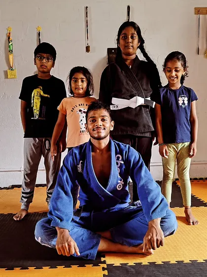Our kids' BJJ program is about more than just martial arts; it's about building confidence, discipline, and having fun. Here I am with the group after a successful summer camp at Sai MMA Academy.