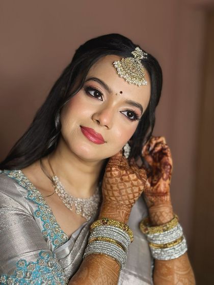 Another beautiful portrait, her expression confident and her makeup flawless.