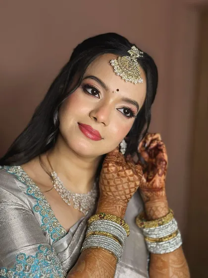 Another beautiful portrait, her expression confident and her makeup flawless.