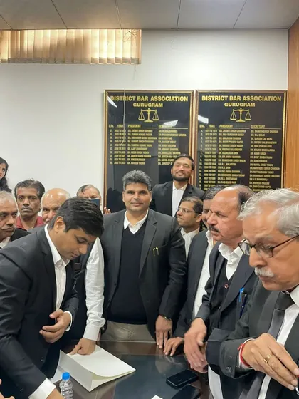 A candid moment during the formal proceedings of the nomination filing.