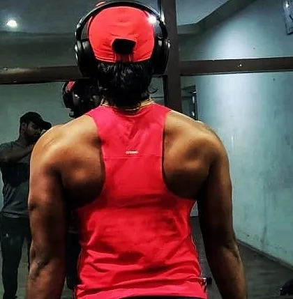 I practice what I preach. This is a shot of my back progress, a result of consistent strength training and proper nutrition. I believe in leading by example and showing what's possible with dedication.