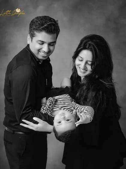 A playful family moment captured in timeless black and white. Sometimes, removing color brings out the emotion even more.