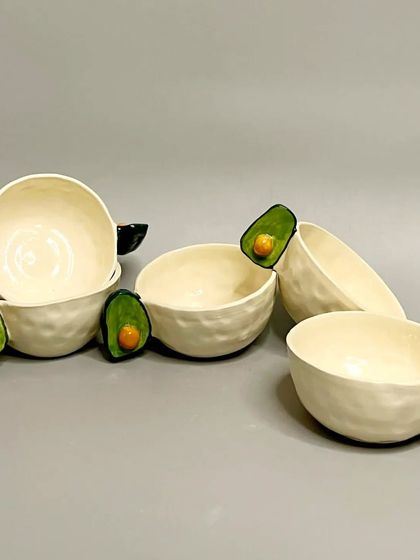 A collection of my adorable avocado mugs, each lovingly made for everyday use. These pieces are perfect for anyone who appreciates a bit of playfulness in their pottery.
