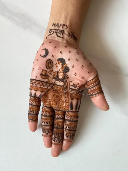A close-up of the Karwachauth figure work. The detail in the woman's attire and the ritual elements is a testament to my love for storytelling.
