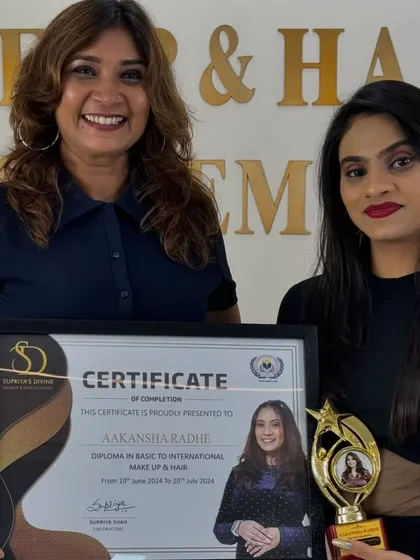 Presenting the certificate of completion to another one of my talented students.