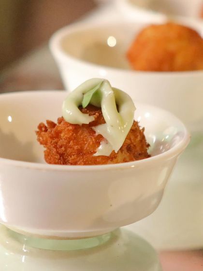 A crispy fried appetizer with a creamy topping. Our pass-around bites are designed to be easy to eat while standing and mingling, without compromising on flavour or presentation.