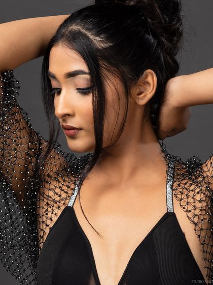 A color-toned version of a portrait, adding a warm and moody feel to the image.