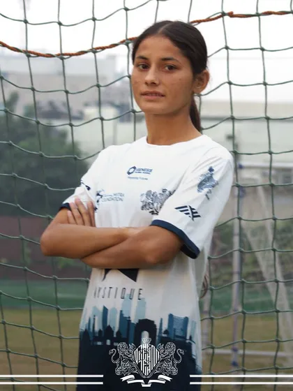 A portrait of a warrior. One of our players standing strong, embodying the spirit of the team.