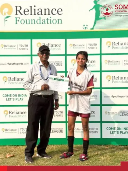 Surishti Rozario receives the Player of the Match award after scoring a goal in Somaiya FC's 2-0 win in the Reliance Foundation Youth Sports U-17 Tournament.