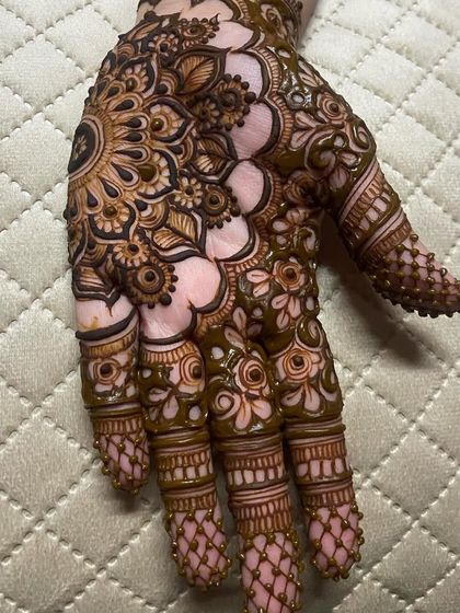 A close-up of the fresh paste, showing the texture and detail of the mandala.