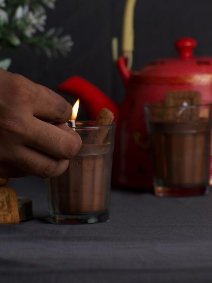 Lighting up my realistic chai candle. Scented with cardamom tea, it's the perfect excuse to have the comforting aroma of chai around you all day long.