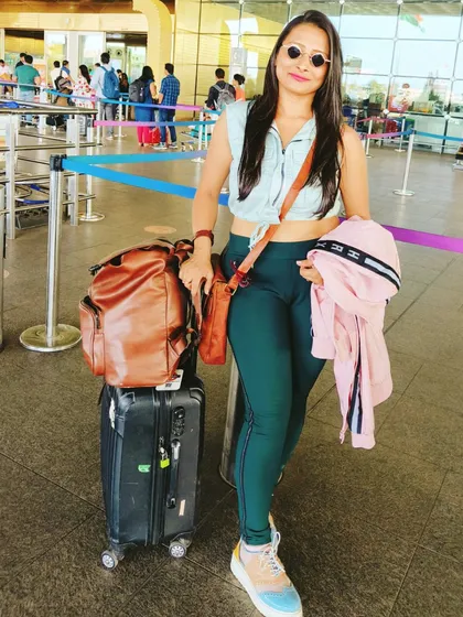 At the airport, ready to board a flight to Udaipur for a wedding. My work as a destination event host involves complete dedication, from traveling to the location to spreading happiness at the event itself.