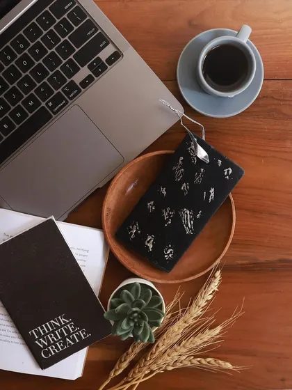 A scented wax tablet shown in a workspace setting, proving its versatility. It's a simple way to bring a pleasant, subtle fragrance to your desk, drawers, or any small space that needs a lift.