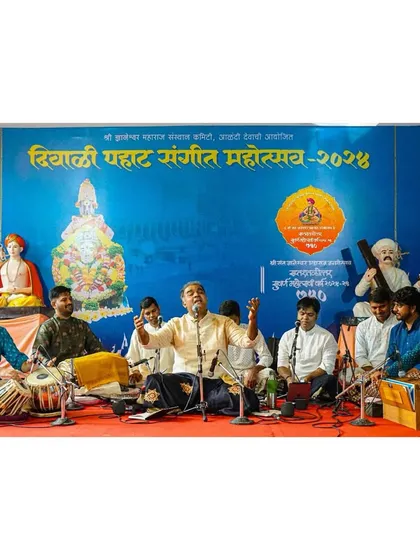 The full stage at Devachi Alandi during the Diwali Pahat Sangeet Mahotsav, a morning concert filled with devotional music.
