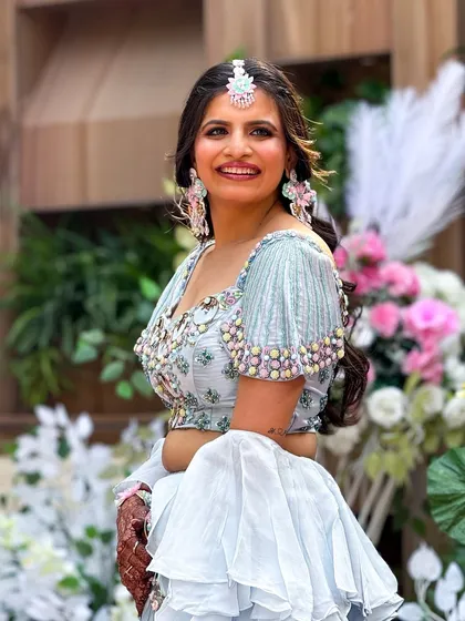 A candid shot of the bride, looking radiant and joyful during her pre-wedding festivities.