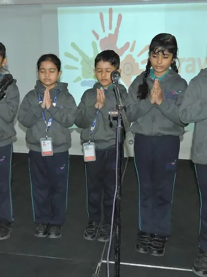 Students lead the morning prayer during a special assembly for International Disability Day, setting a tone of empathy and respect.