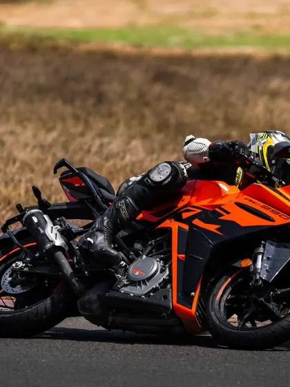 A rider on a KTM RC390, a popular choice for track riding in India, perfectly positioned mid-corner. These bikes are fantastic tools for honing your skills.