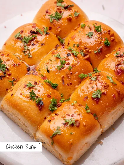Soft, fluffy, and flavourful. These pull-apart Chicken Buns are brushed with a garlic-herb glaze and are perfect for sharing.