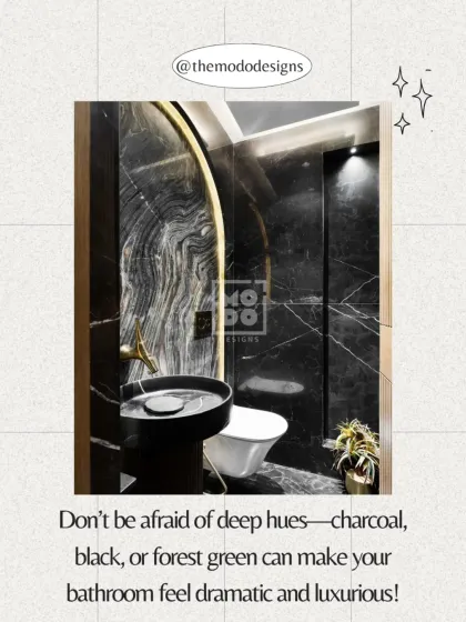 Don't be afraid of deep hues. Charcoal, black, or forest green, as seen in this dramatic black marble bathroom, can make your space feel incredibly luxurious.