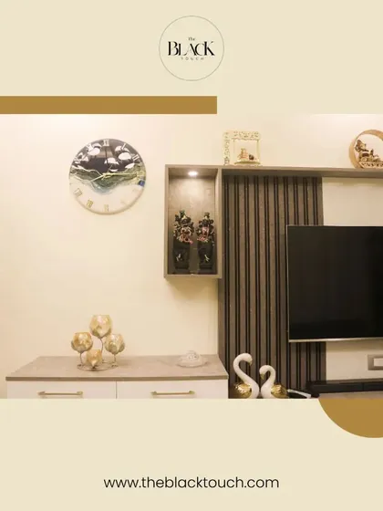 A close-up of a media unit with elegant decor pieces. We believe that small details and personal touches are what make a house a home.