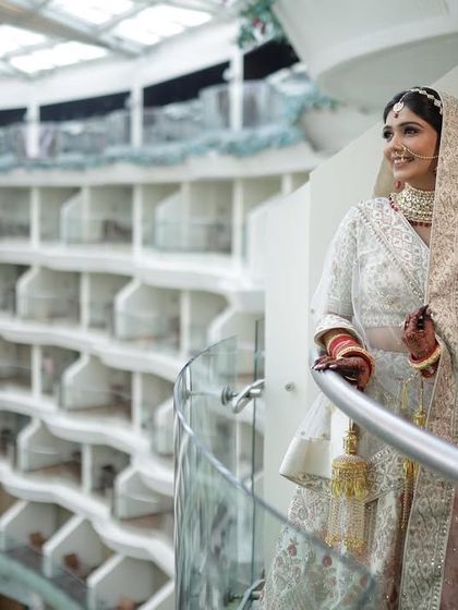 Another beautiful balcony shot, showing her full look from a different angle.