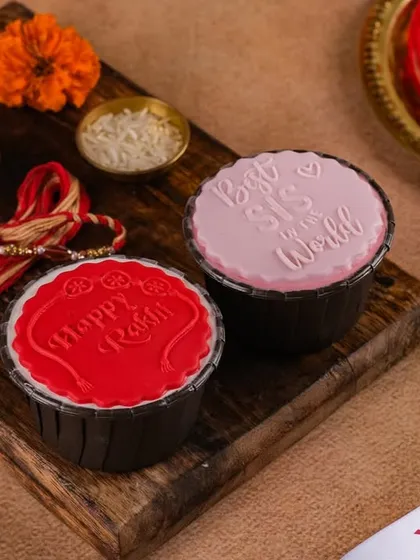 Personalized cupcakes for Rakhi. This set includes messages like "Happy Rakhi" and "Best Sis in the World" to celebrate your unique bond.