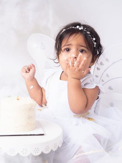 A tentative first taste. Not all babies dive right in, and capturing their cautious exploration is just as adorable.