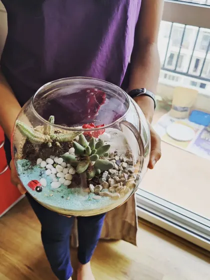 There is nothing more rewarding than seeing the pride on a young creator's face. This is from one of my kids' terrarium workshops, a fun and engaging activity that lets families connect with nature and each other.