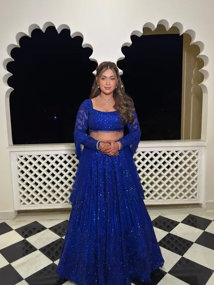 Tanisha looked absolutely stunning for her sangeet in this royal blue lehenga. We gave her soft shimmer eyes, gorgeous wings, and the perfect nude lip.