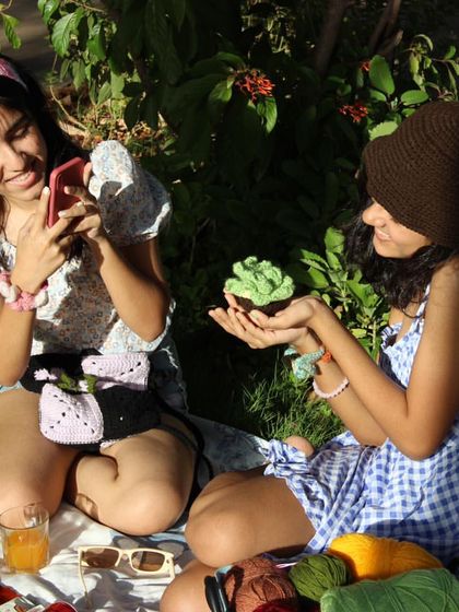 A glimpse from a photoshoot for my products. Having a picnic with friends and my crochet creations is the best way to spend an afternoon.
