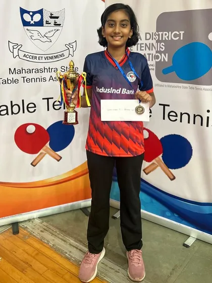 Mahika Susvirkar proudly displays her silver medal and trophy after a courageous performance in the U-11 category at the Maharashtra State Championship.