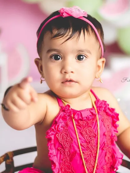 "You! Come join my watermelon party!" This little girl's first birthday shoot was full of color, fun, and sweet expressions.