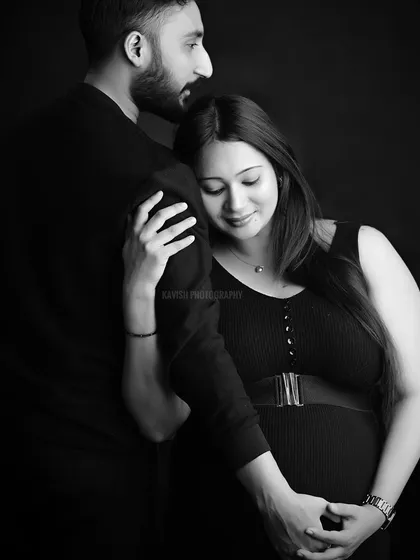 A tender and quiet moment between the expecting couple, shot in a beautiful monochrome style.