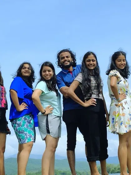 A fun, synchronized pose by our travelers at Yagachi Dam in Chikmagalur.