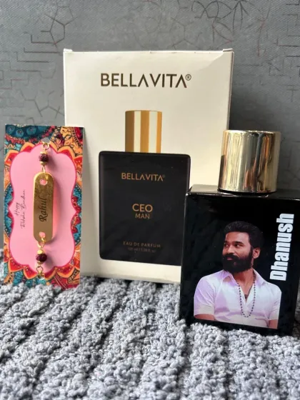 This combo includes a customized photo Bella Vita perfume and a name-engraved Rudraksha rakhi, presented in a premium box.
