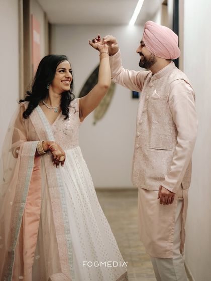 A joyful moment from an engagement ceremony, with the couple sharing a dance. I capture the happiness and celebration of these important pre-wedding events.