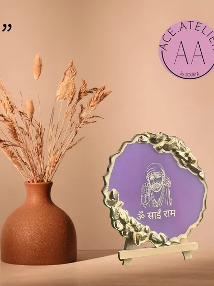 A 5-inch Sai Baba mantra frame in purple with a gold geode edge, offering a simple and elegant way to feel the blessings.