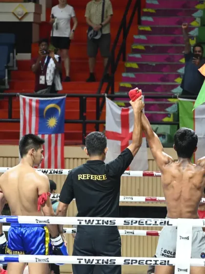 Taking our skills to the international stage. Here, one of our fighters celebrates a hard-earned victory at the World Muay Thai Championship, representing not just our gym, but India.