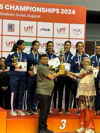 Our women's team on the bronze medal podium at the 86th Senior National Championships in Surat. This group photograph captures the collective joy and pride of winning a national medal together as a team.